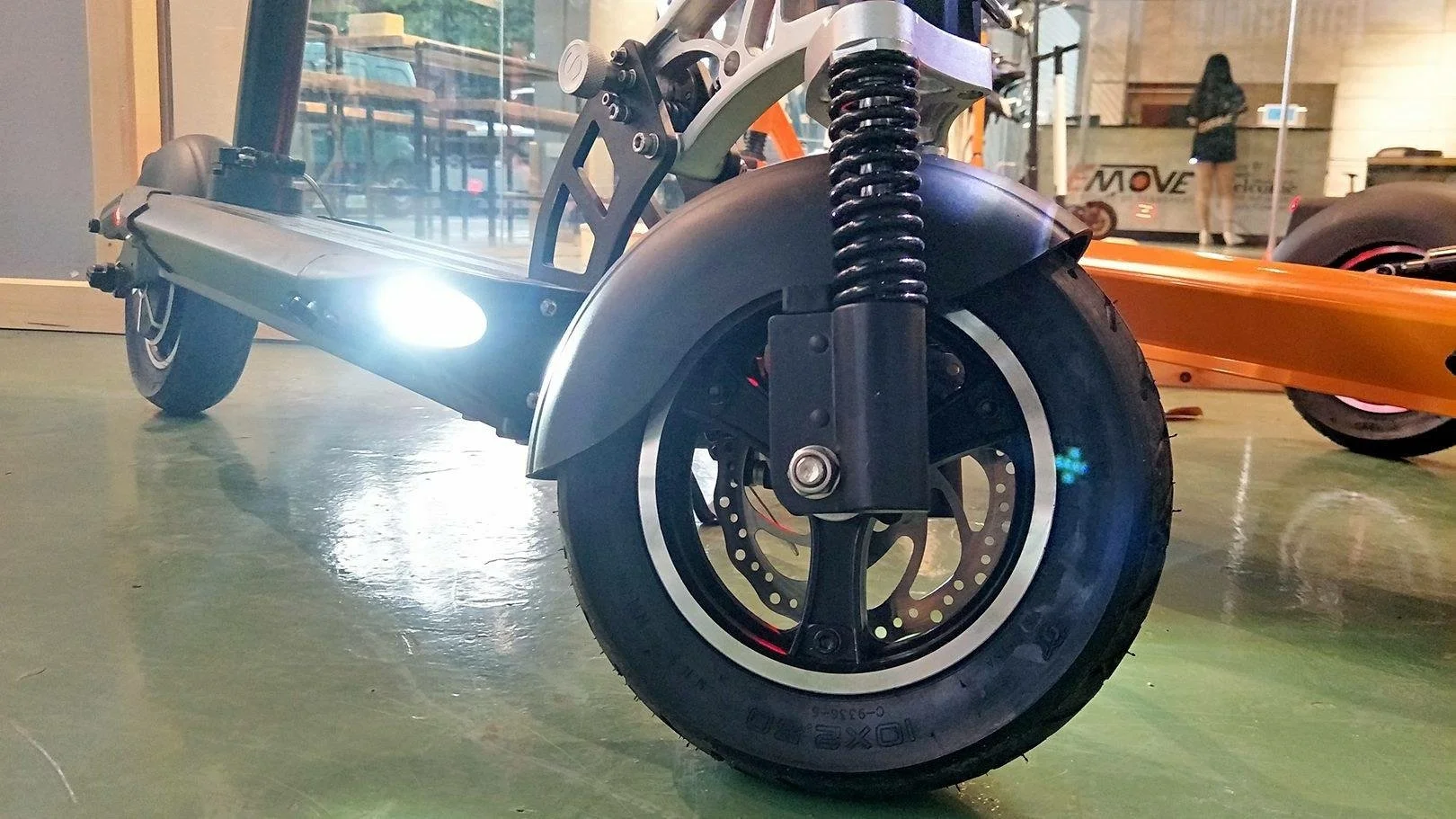 The eMove Cruiser has LED lights integrated into the deck, rides on 10 inch pneumatic tires and features dual suspension
