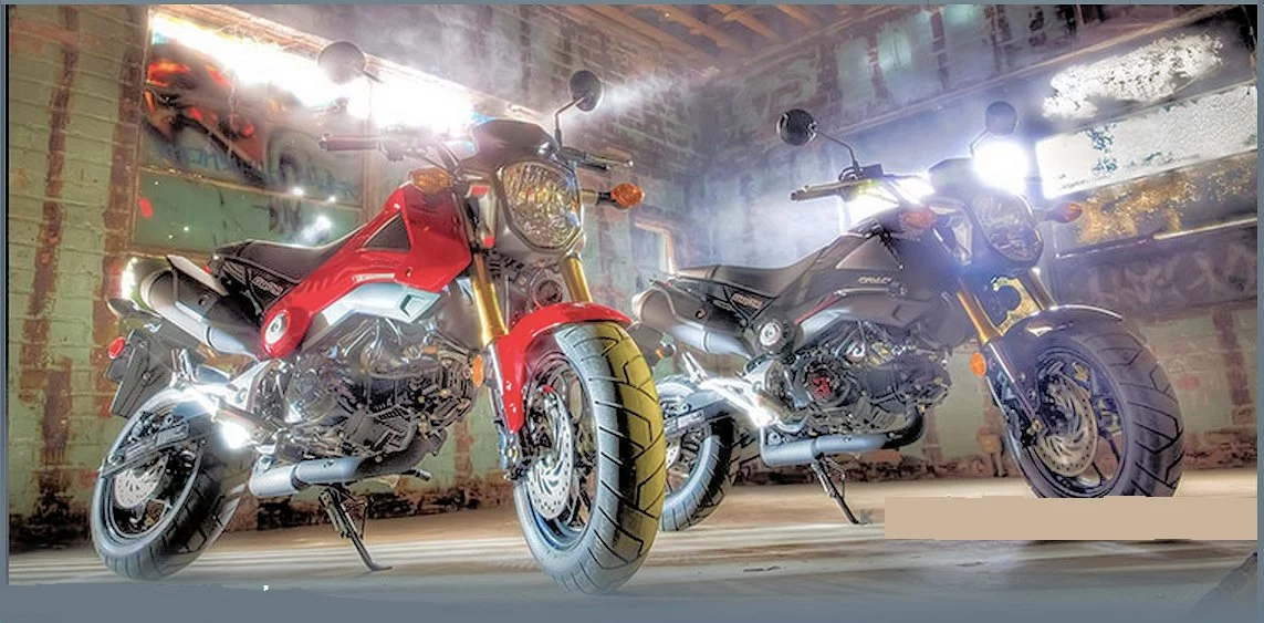 The two colors of Honda's Grom ready for action (Photo: Honda Powersports)