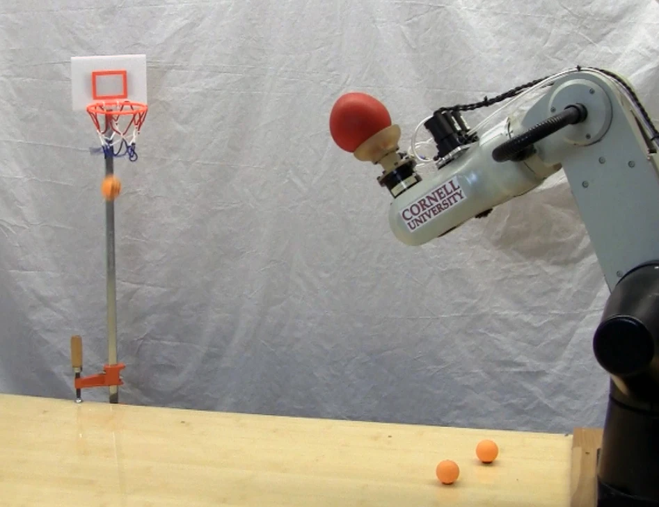 The robotic universal jamming gripper shoots, The robotic universal jamming gripper scores (Photo: John Amend, Cornell University)