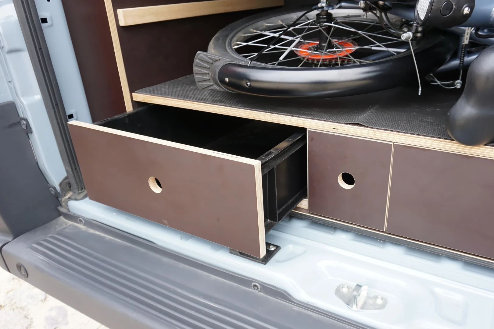 Lots of storage space and hidden drawers are found at the rear of the van