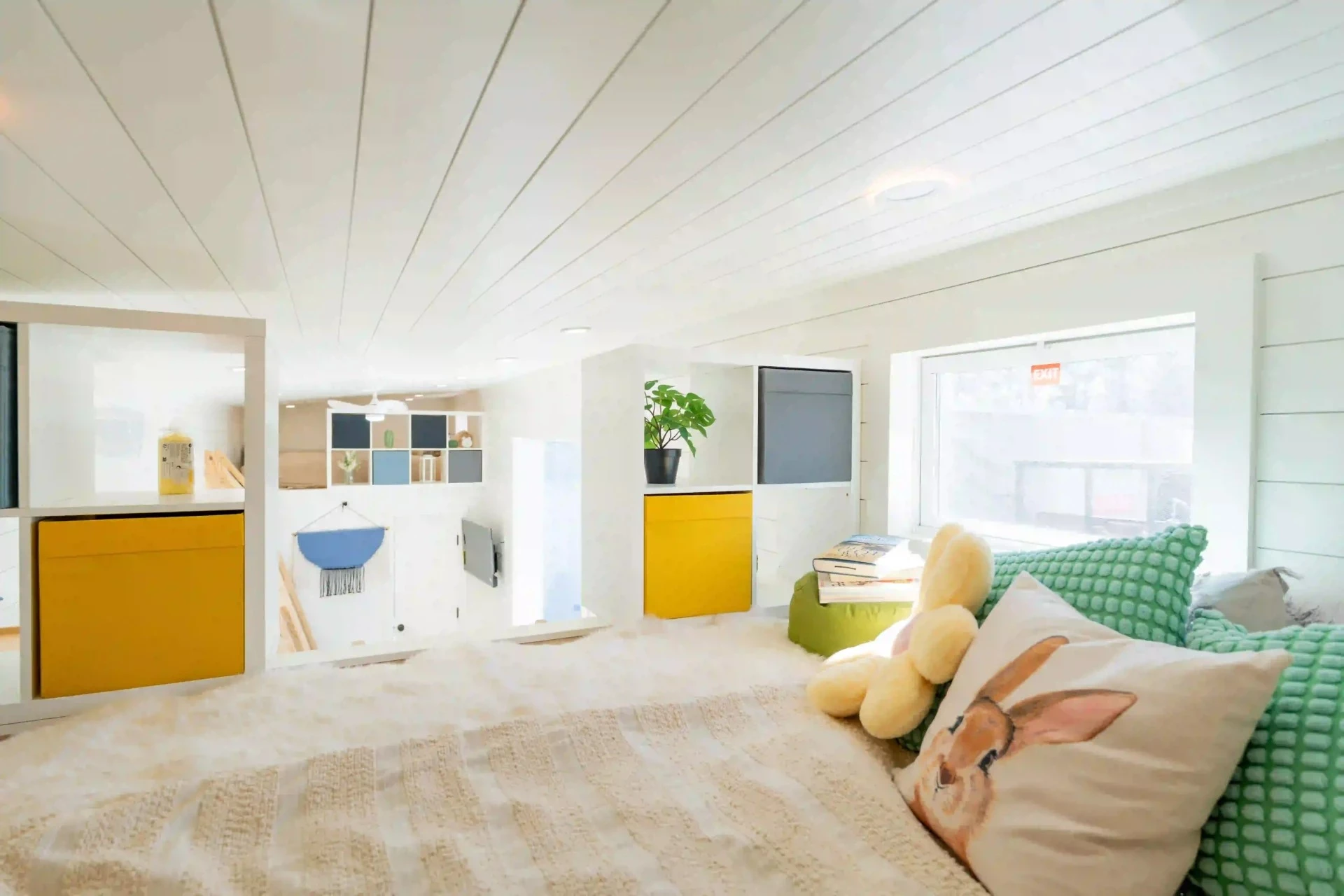 The loft bedrooms in the Avalon 32' are reached by removable wooden ladders and both have low ceilings