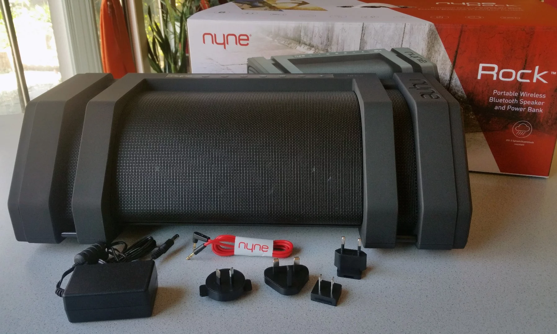 Included with the Nyne Rock is documentation, an audio cable, the wall adapter, and an assortment of international plug tips
