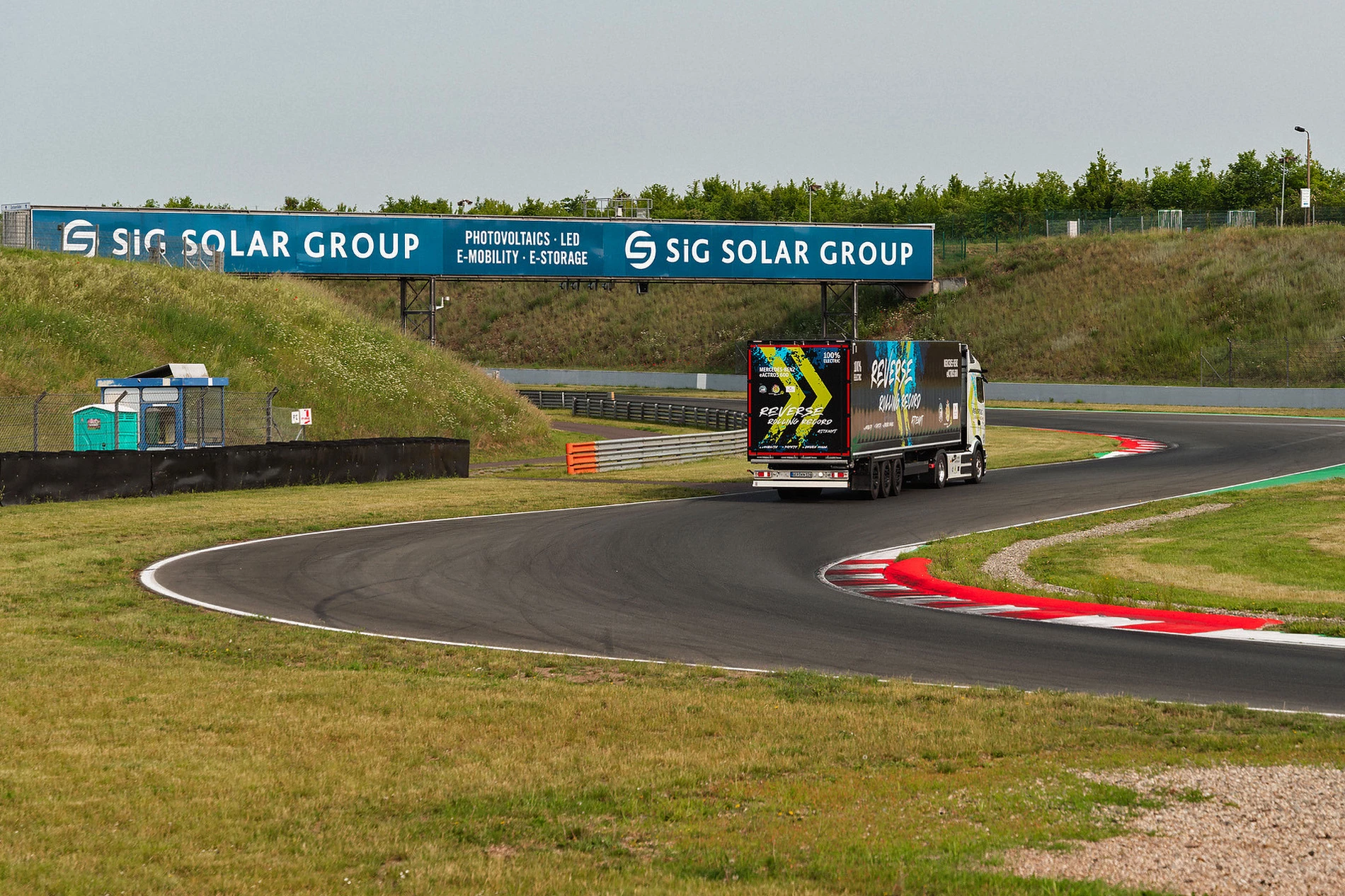 The Mercedes-Benz eActros 600 electric truck hit at least a few apexes at the Motorsport Arena Oschersleben racetrack in Germany while it snaked its way around the track in reverse