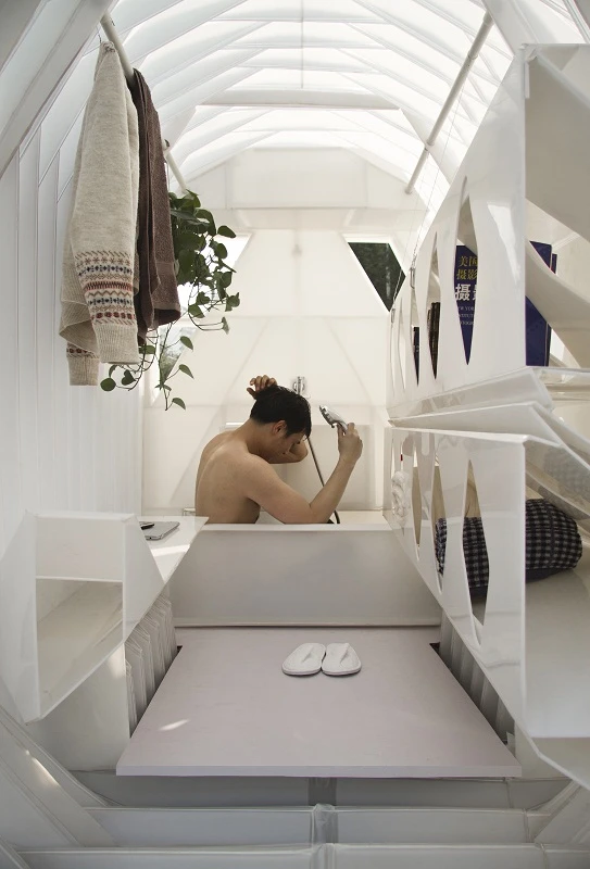 While there's no room to swing the proverbial cat, there is a small bathtub