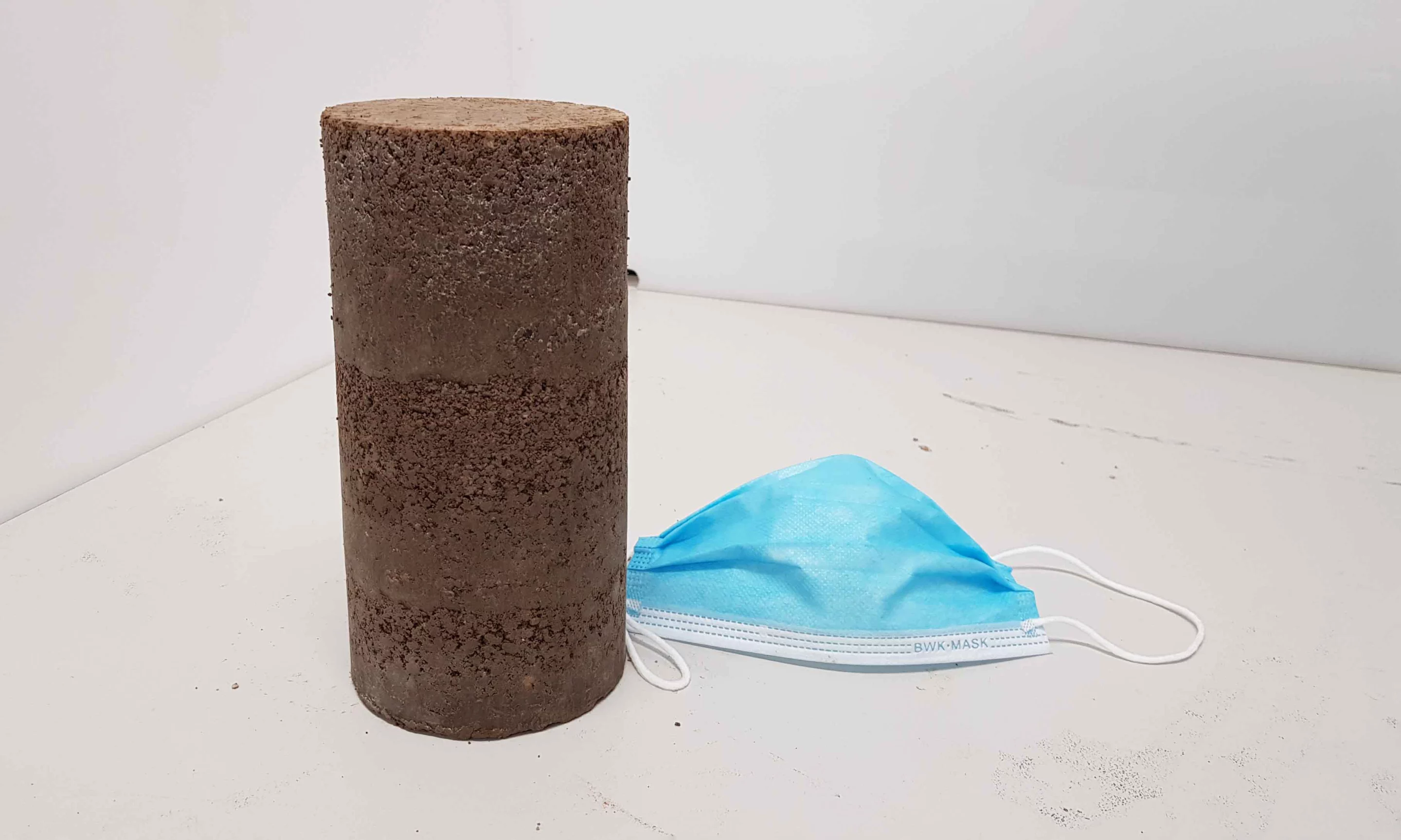 A sample of the road material made with the help of surgical face masks
