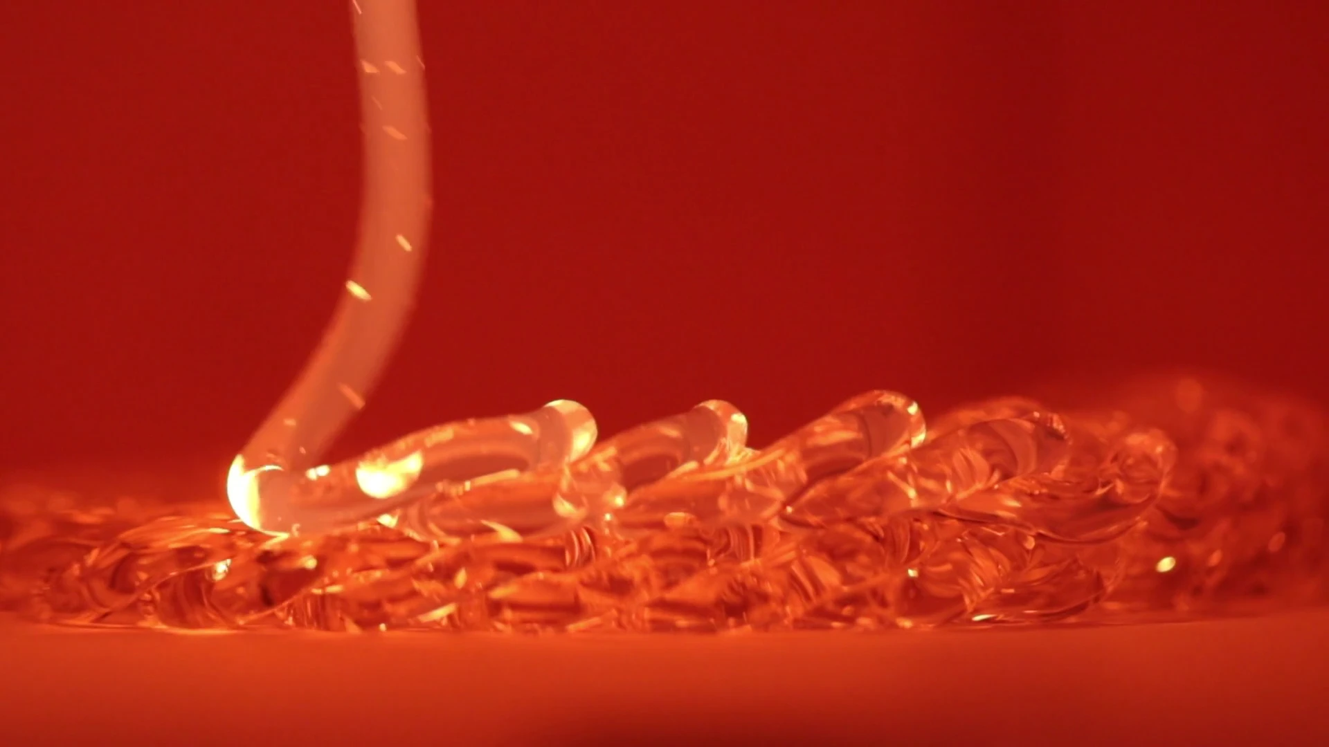 A team of researchers led by Neri Oxman out of MIT’s Mediated Matter Group has developed a 3D printing process that extrudes molten glass