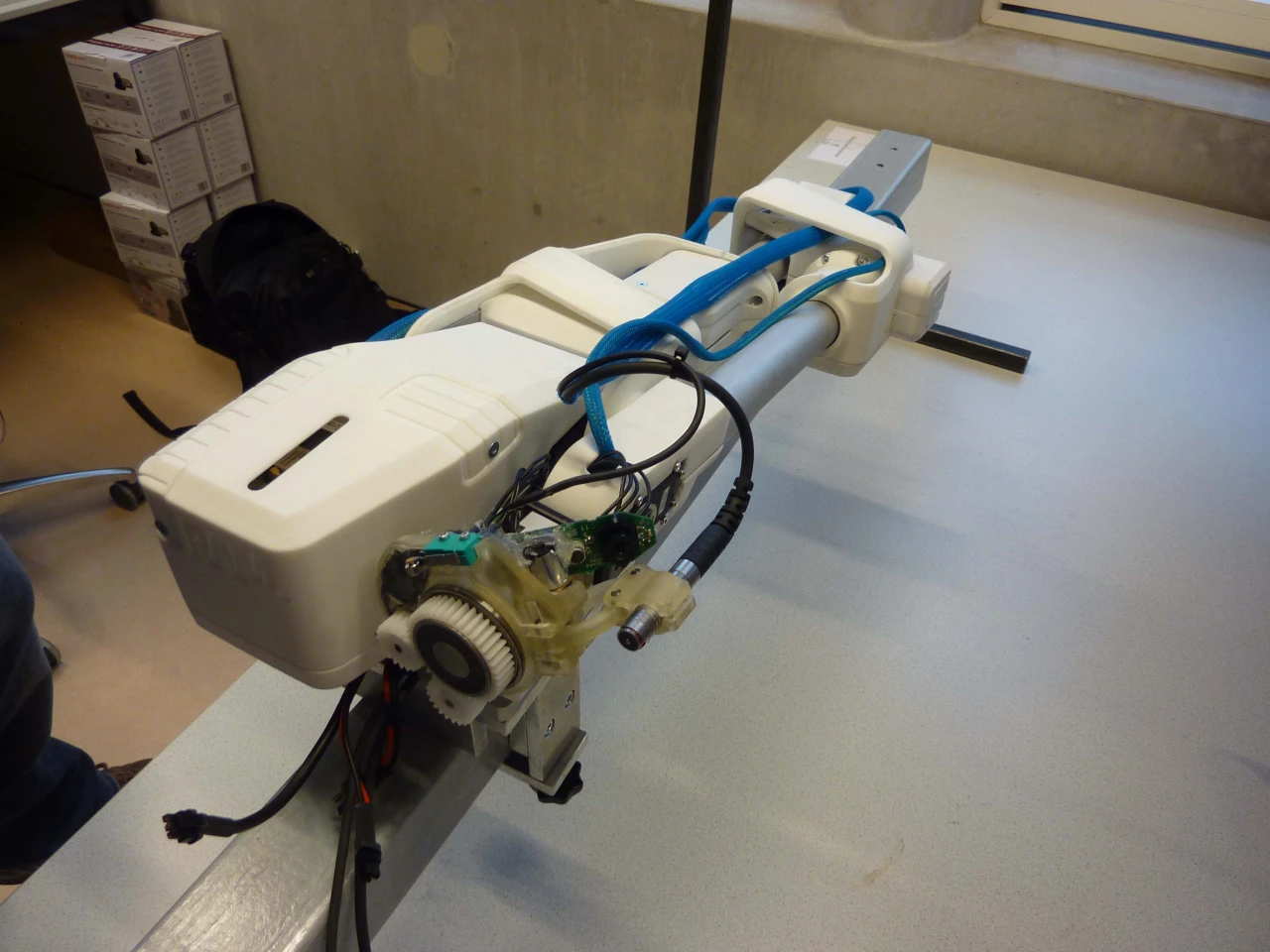 Moving along a roller coaster-like set of rails built into the ballast tank, the robot uses a camera and multiple other sensors to inspect the steel