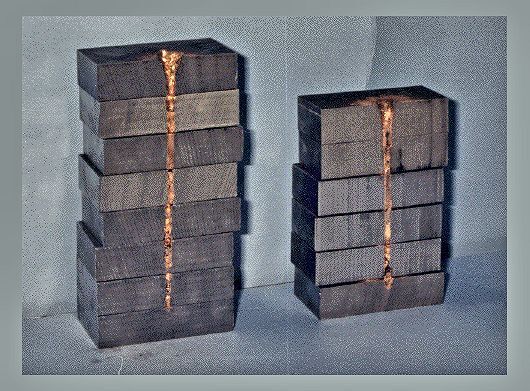 Penetration testing of explosives – on the right is the penetration of a 30 gram HMX shaped charge, and on the left is the penetration of a 30 gram CL-20 shaped charge (Photo: US Navy)