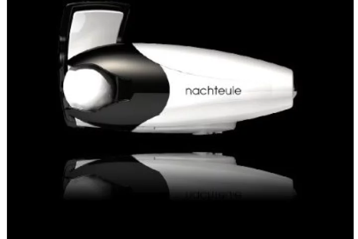 The Nachteule light clips on to reading glasses - its LED produces the equivalent of a 60W globe