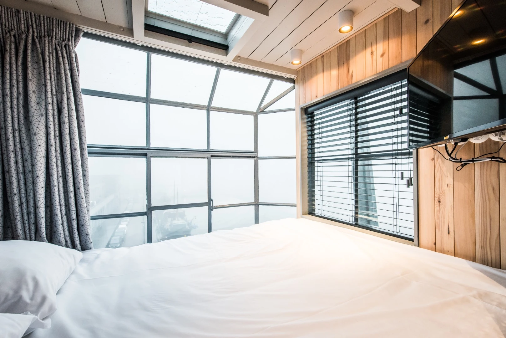 The Yays – Crane Apartment's uppermost bedroom is located in the original machine operator room