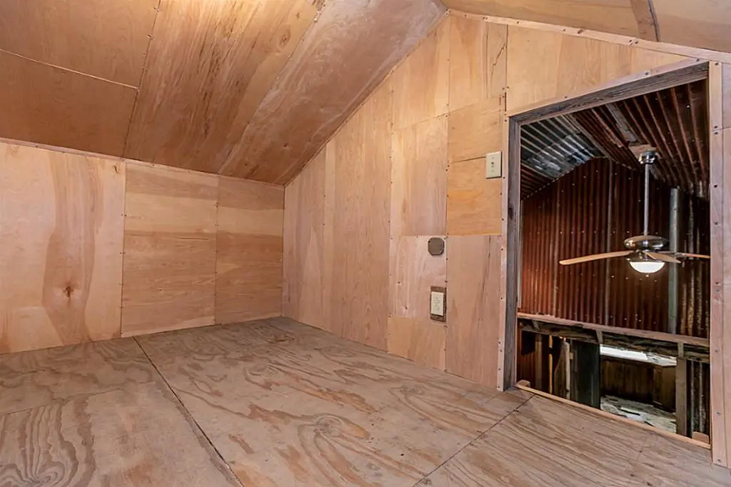 The Cowboy Boot House's second bedroom is reached by ladder