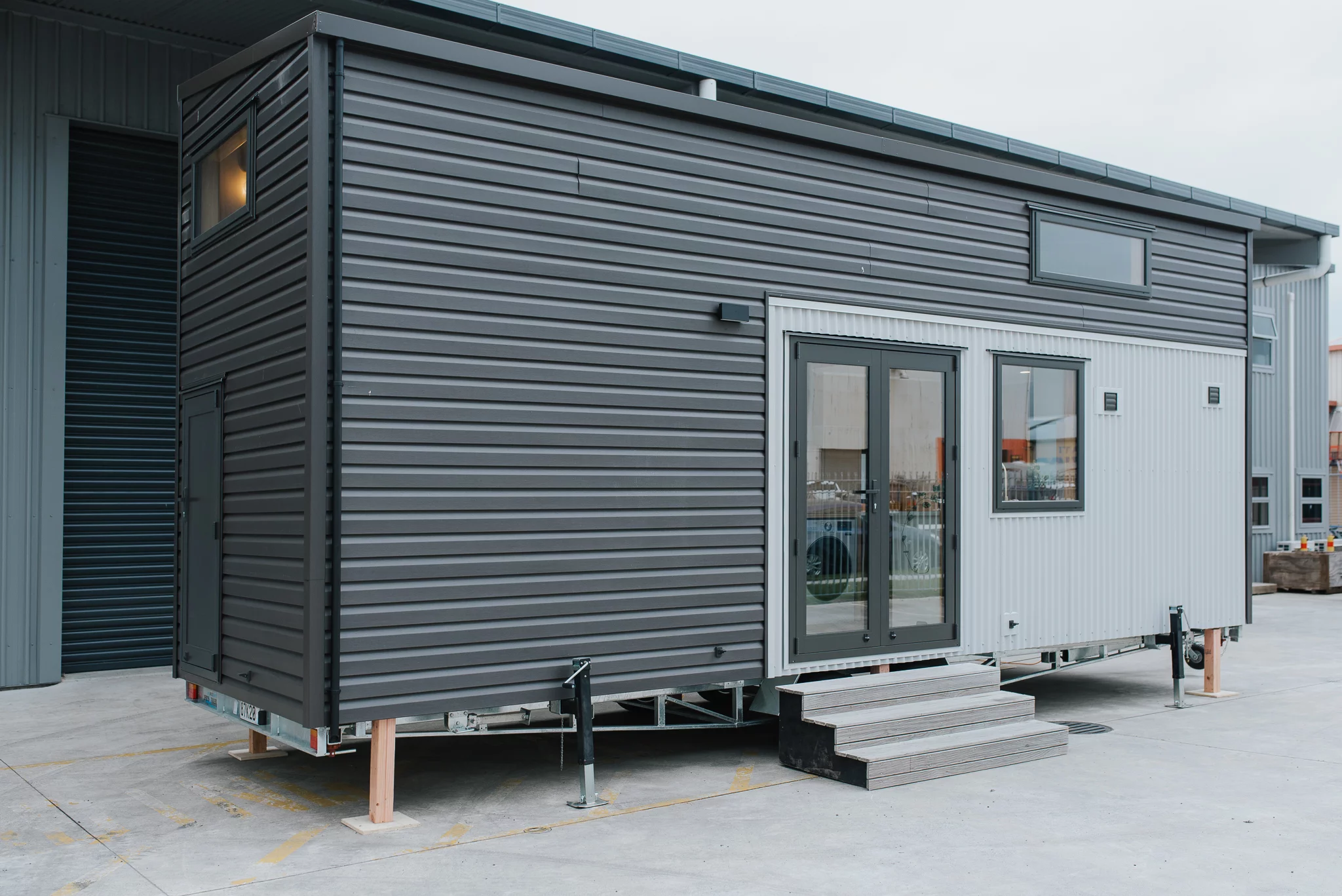 The Kererū Tiny House measures 8 m (26 ft) in length, and is based on a double-axle trailer that can be removed for more permanent placement