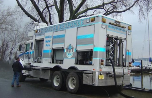Ecosphere Technologies' mobile water purification truck in action.