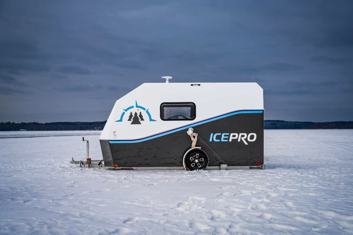 The IcePro's manual winch axle system drops its floor down to the ice for drilling and fishing