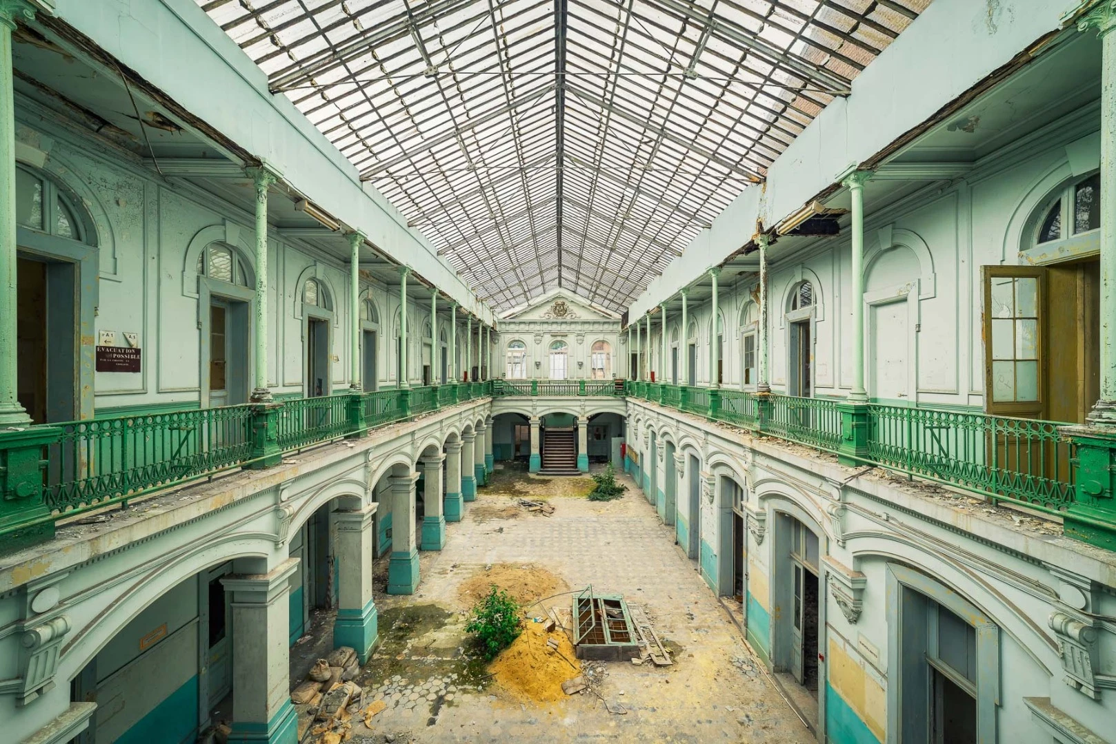 This foyer is located in an abandoned all-girls' gymnasium, back when this building was populated, men were not allowed in. But since the 90s, the building with this beautiful architecture increasingly decayed