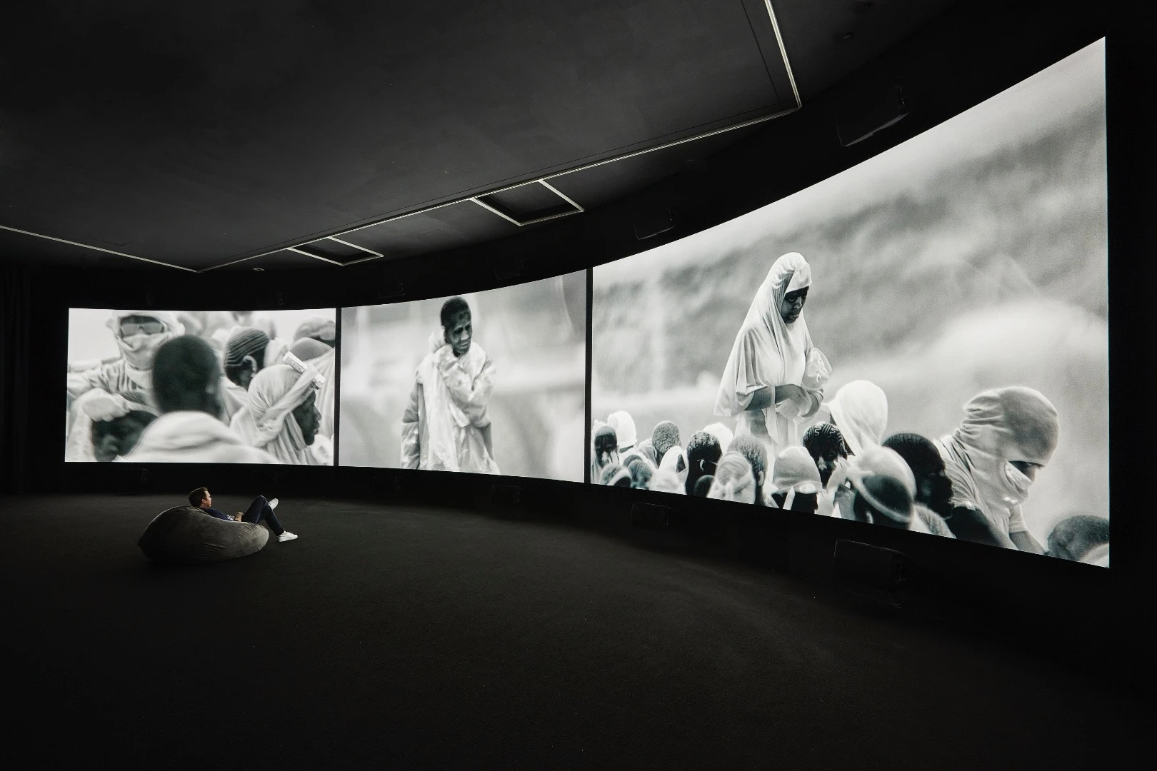 Installation view of Richard Mosse Incoming 2015 – 2016 which is on display in NGV Triennial at NGV International, 2017