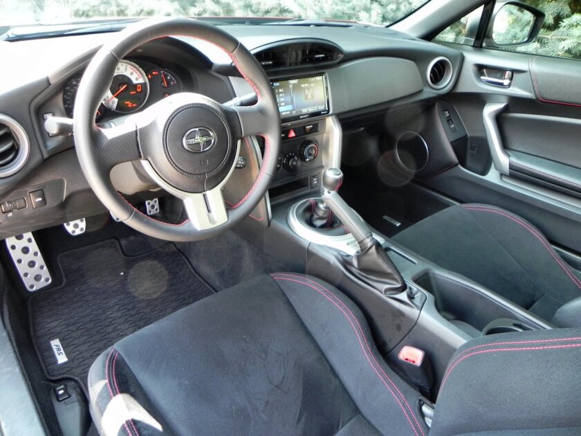 The interior of the 2016 Scion FR-S is spartan, in a modern, back-to-basics sports car kind of way