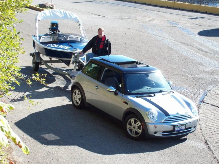 The Sportboat Zingy being towed behind its automotive equivalent