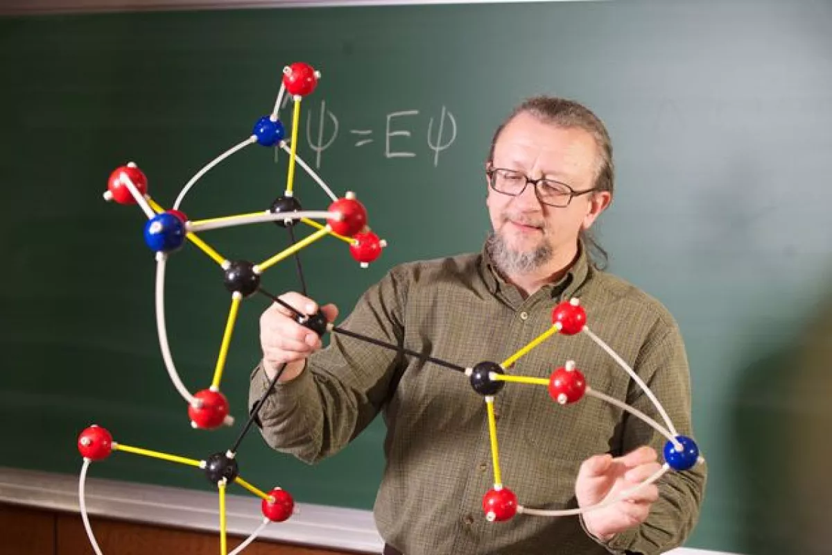 Prof. Robert Zoellner, with a model of the molecule created by ten year-old Clara Lazen