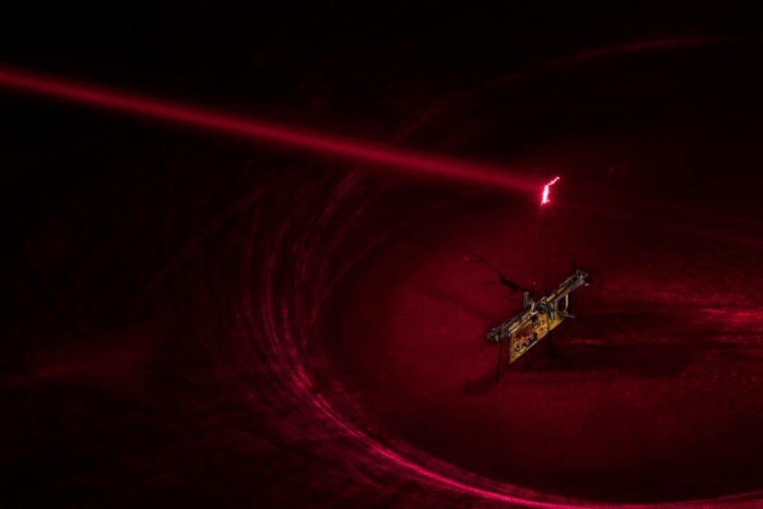 RoboFly is powered by a laser