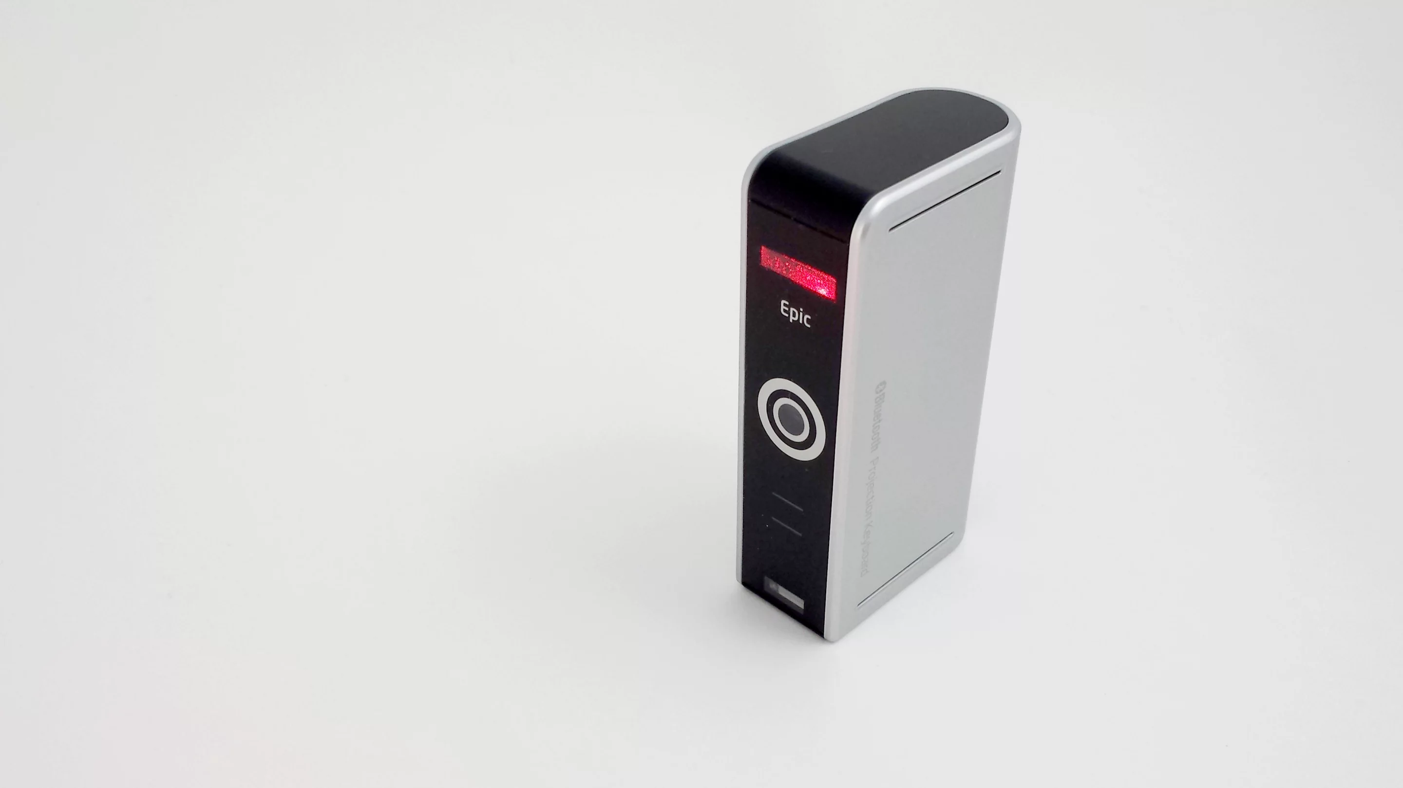 The Epic projects the keyboard from the top of the device, and senses keystrokes via infrared at the bottom of the device