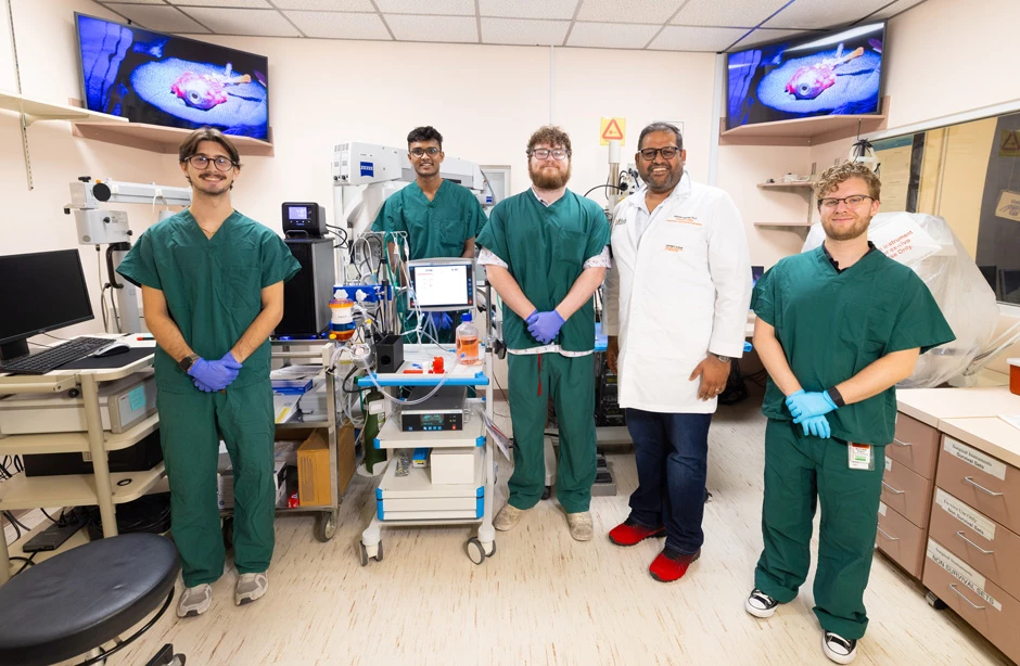 From left: Alexander Carrieri, Atharva Dapse, William Raeter, Ashutosh Agarwal and Matthew Koble surround the eye-ECMO device that they created and recently tested with a donor eye at the McKnight Vision Research Center