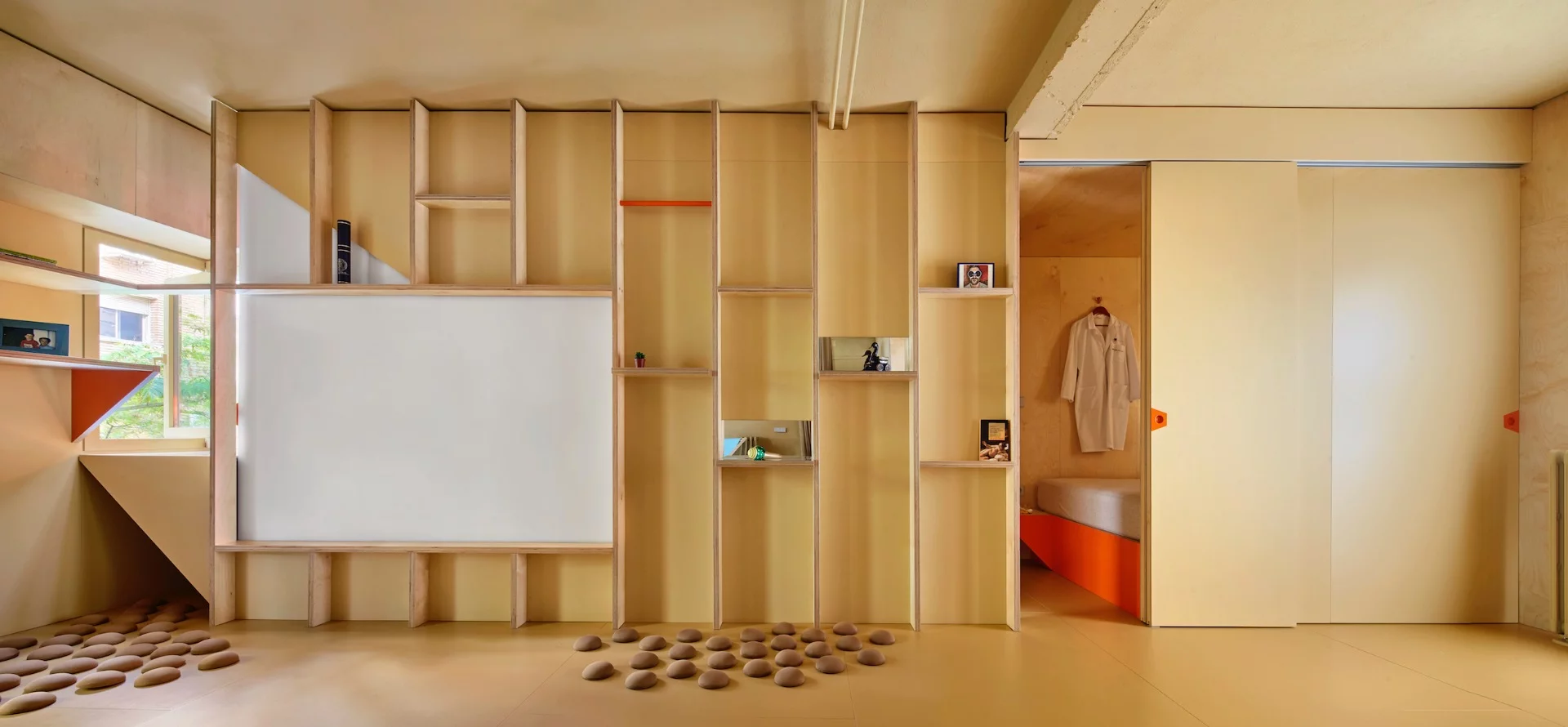 The sleeping pod, shown with the cover pulled down to serve as a projection screen