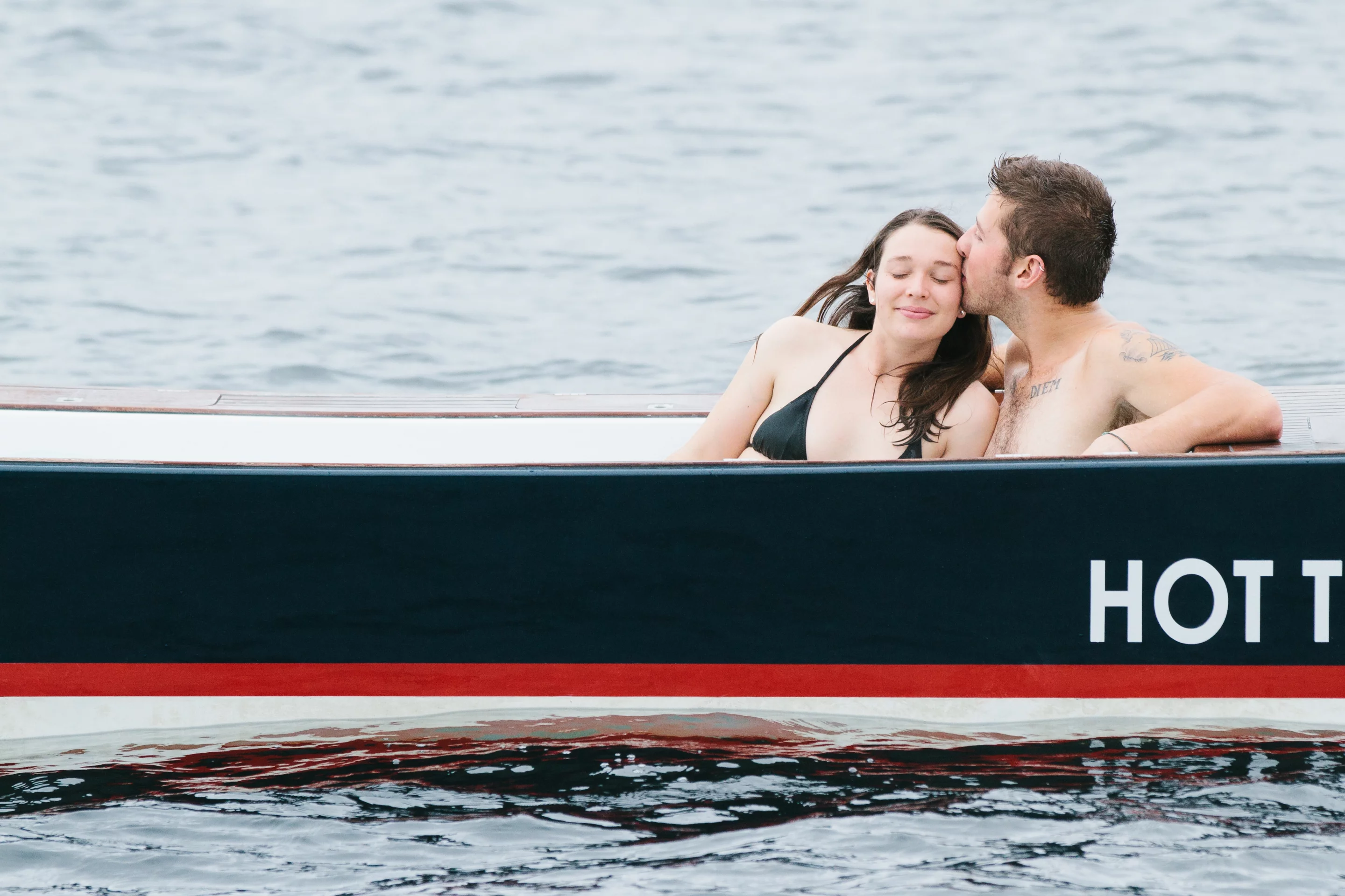 The Hot Tub Boat allows its passengers to soak while they cruise