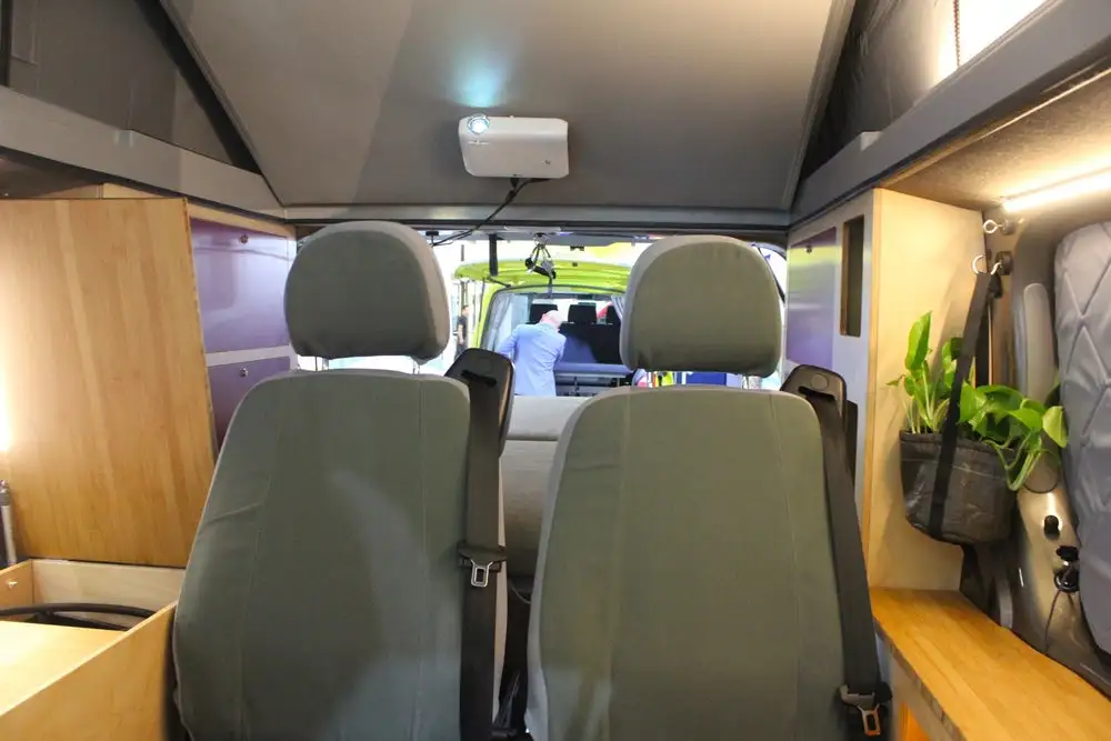 The magnetic LG projector can stick to the underside of Kompanja's lift-away roof bed