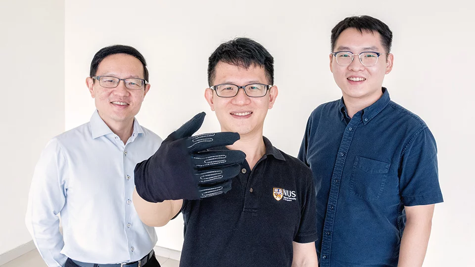 The InfinityGlove team, Prof. Lim Chwee Teck (left), Dr. Yeo Joo Chuan and Dr. Yu Longteng