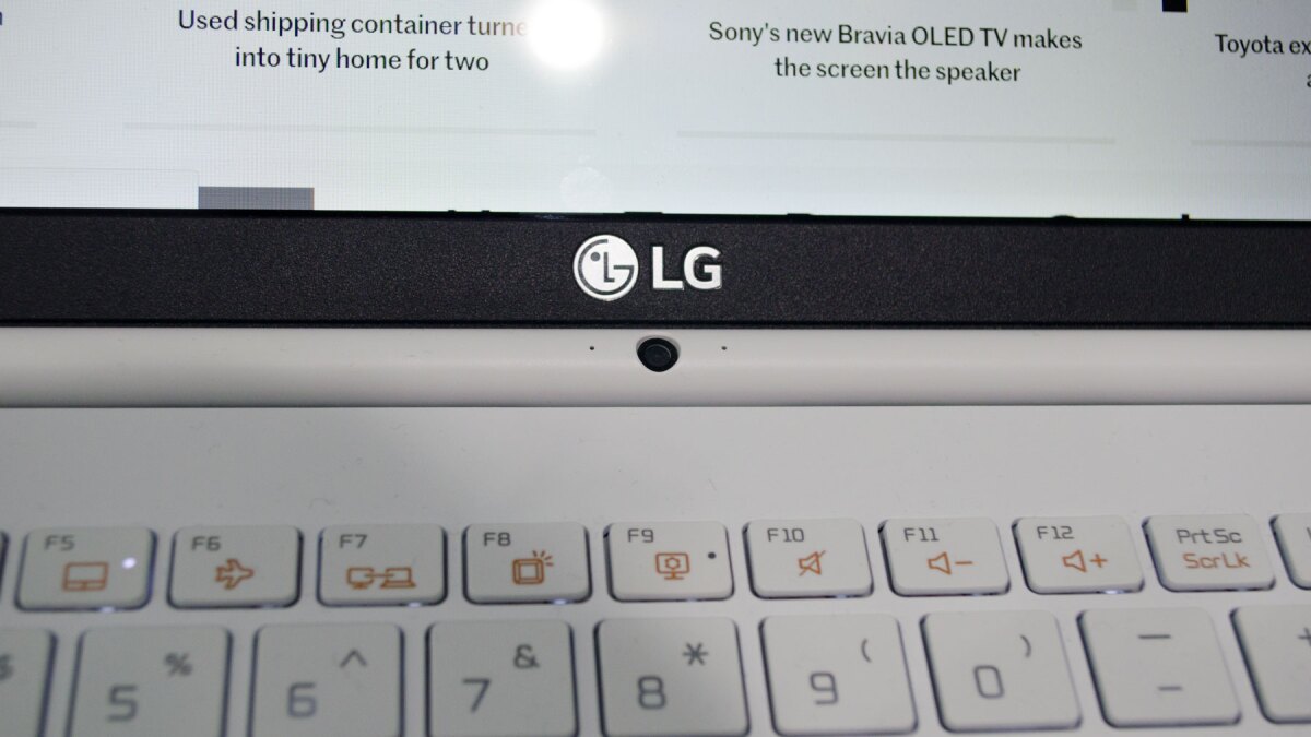Below the display is not the best placement for a webcam