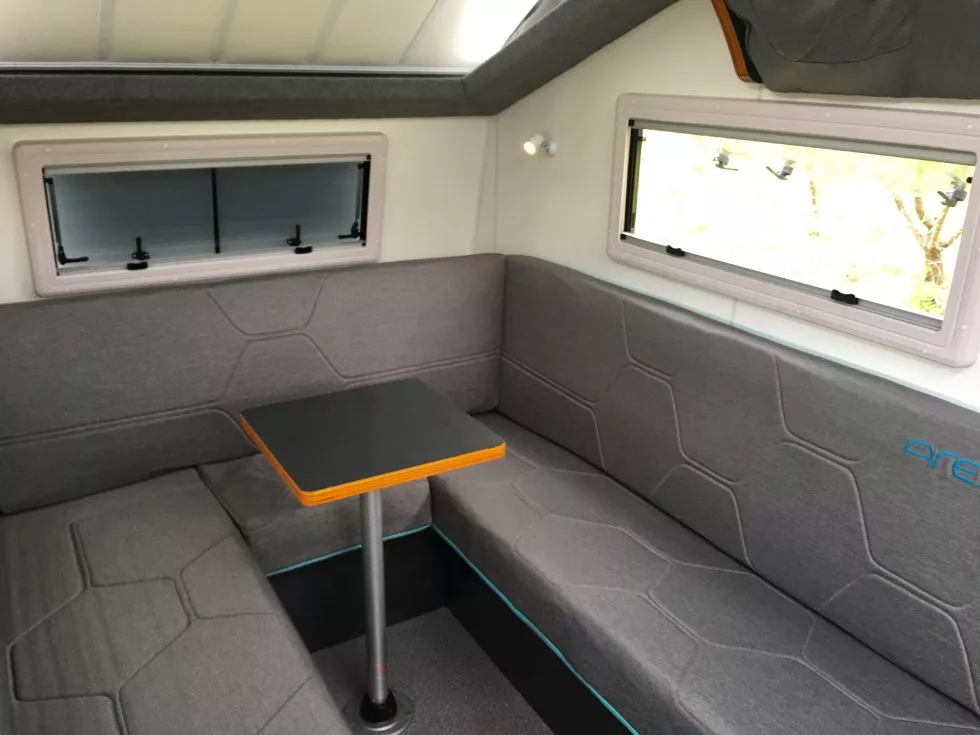 Inside, the Ares offers a convertible lounge/bed and loft kids' bed