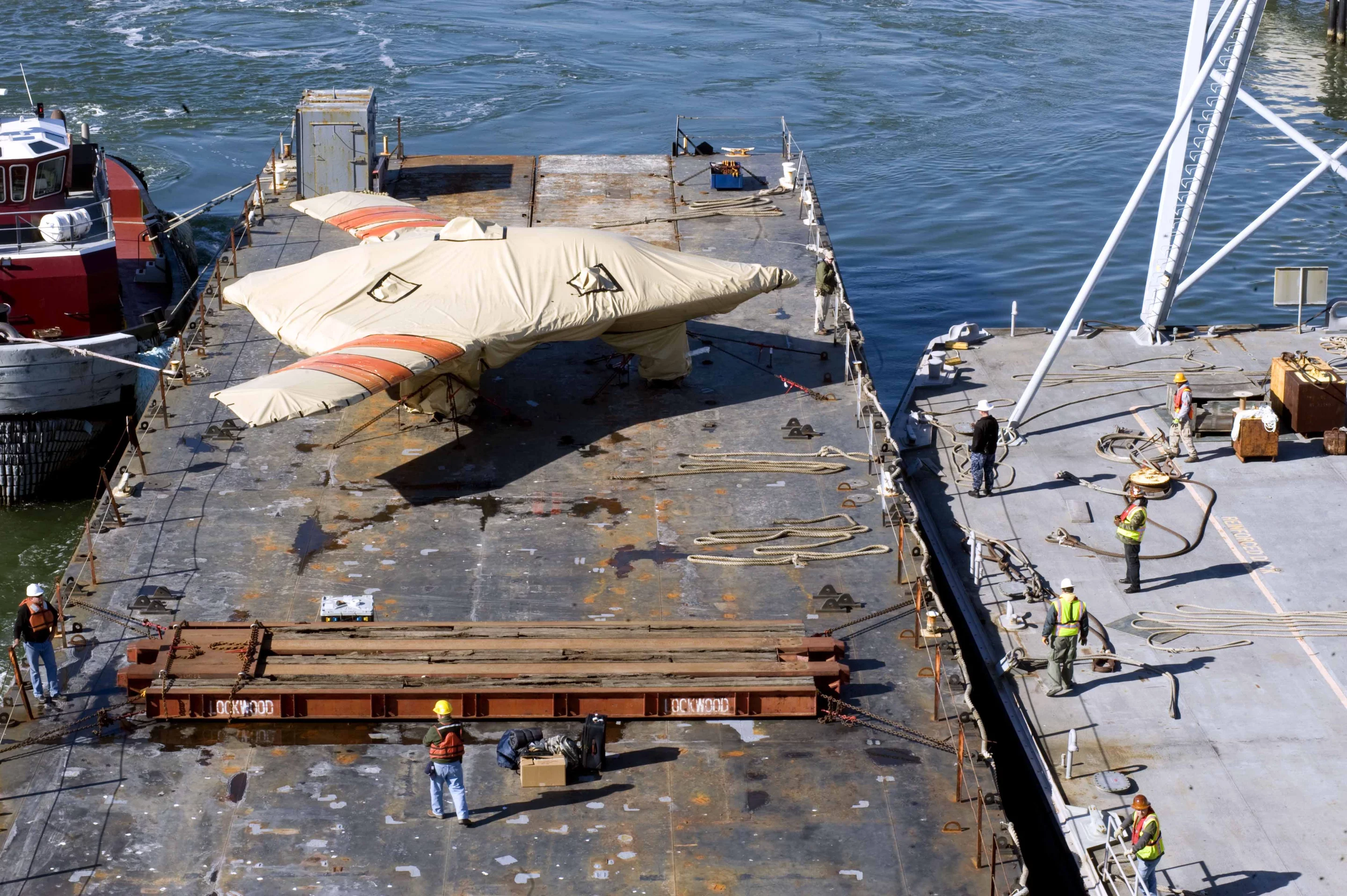 The Northrop Grumman X-47B being shipped aboard the USS Harry S. Truman