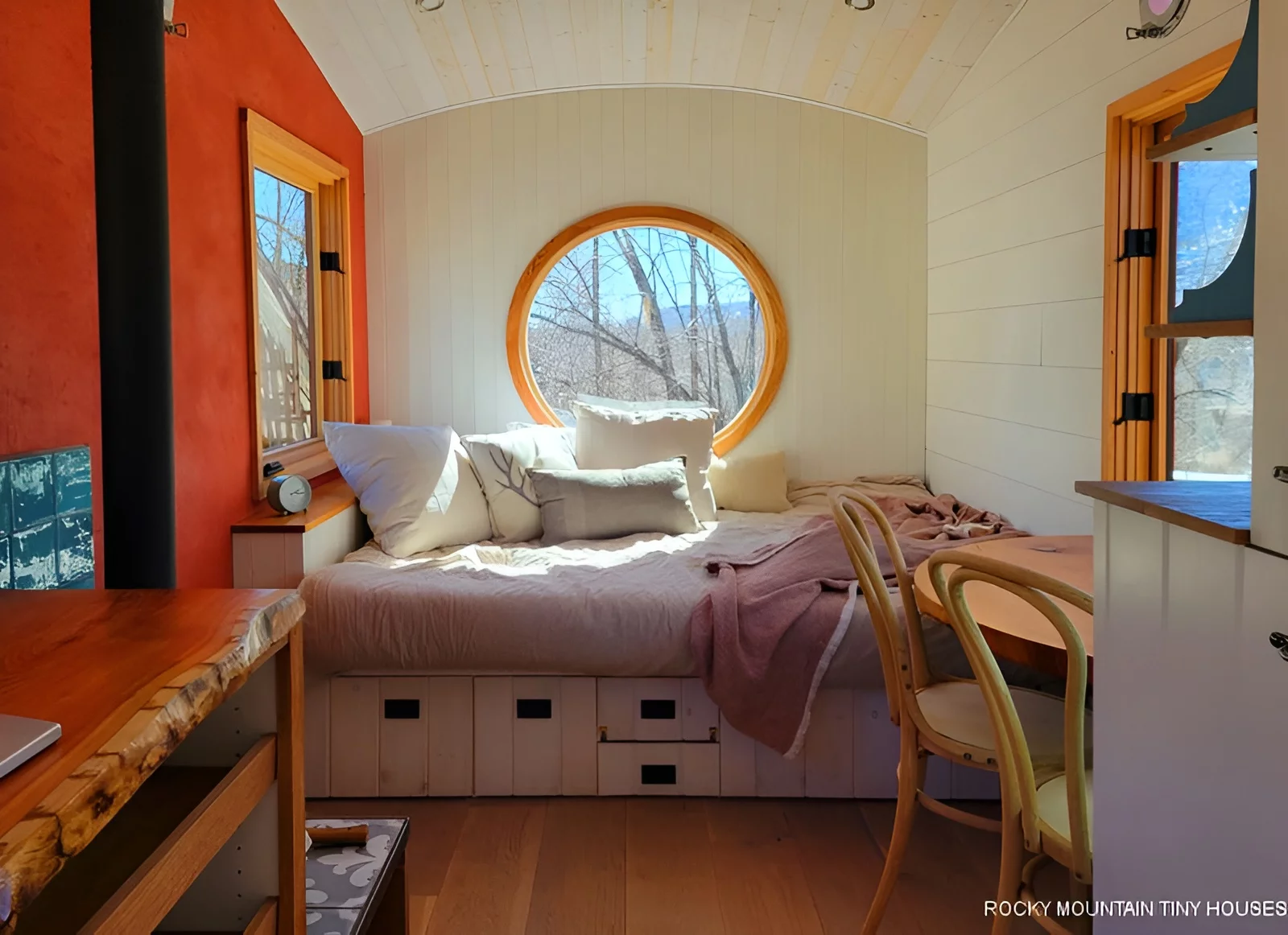 The Beatle's living/sleeping area features a raised bed with integrated storage space