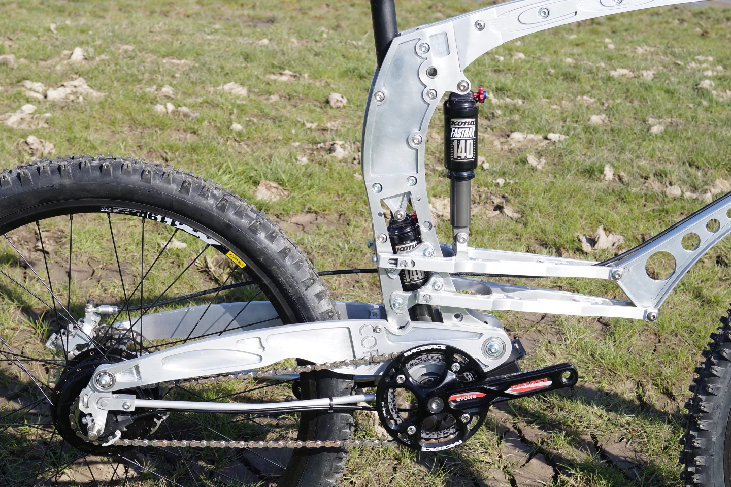 The rear pivot point of the top A-arm is adjustable, allowing the path of the lower yoke to be altered for different riding conditions