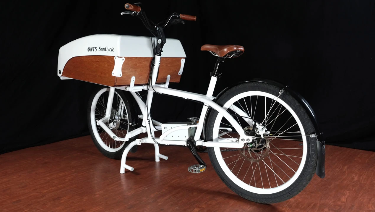 An NTS-specific linkage system that allows the cargo bike to be steered more like a regular bicycle
