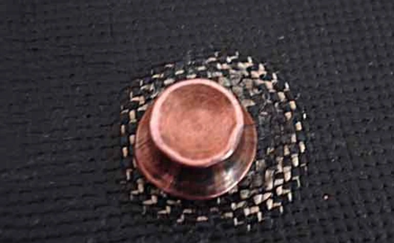 The Diamond Armor suit's bullet-proof fabric was developed by body-armor maker Croshield