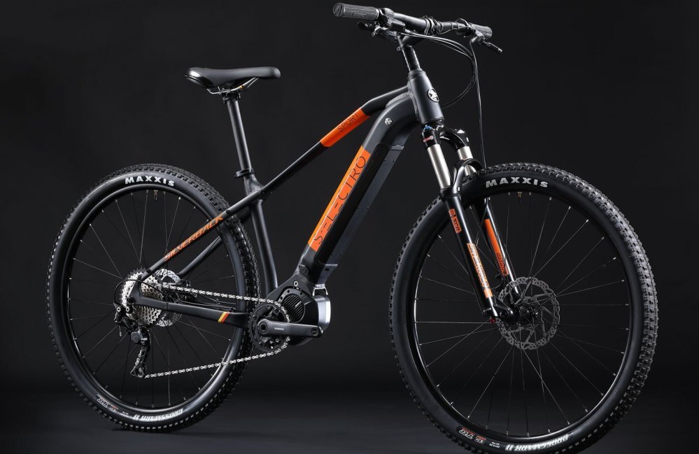 Features a drop-down frame-integrated battery and front fork suspension with 100 mm of travel