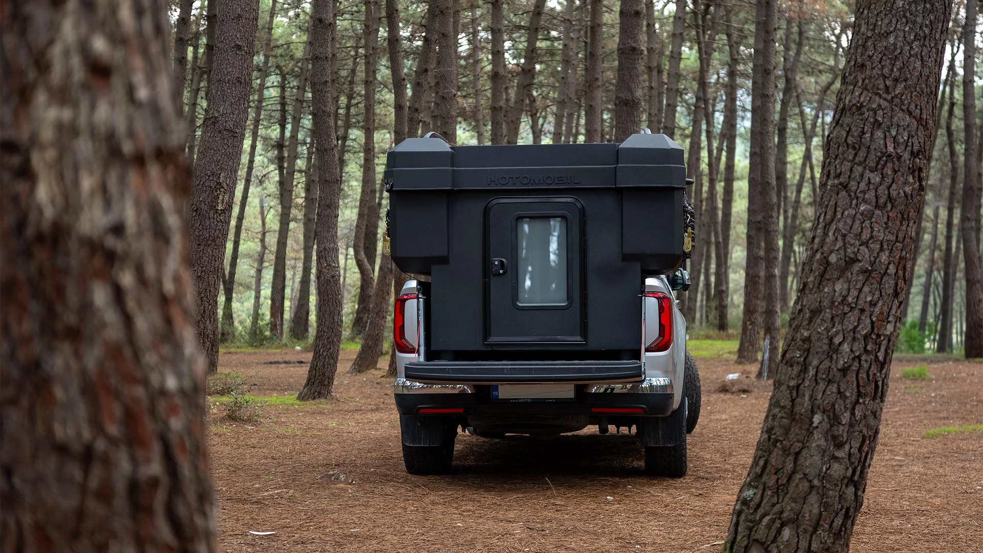 Unlike the popular camping topper, the Atlas is a full pickup camper with floor and door