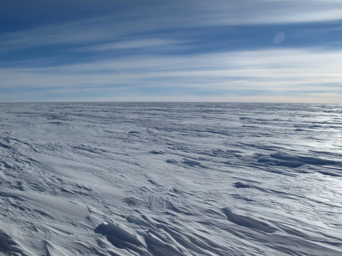 The coldest spots form when old, dense pockets of air are able to sit inside shallow dips in the ice sheet, and remain there for several days
