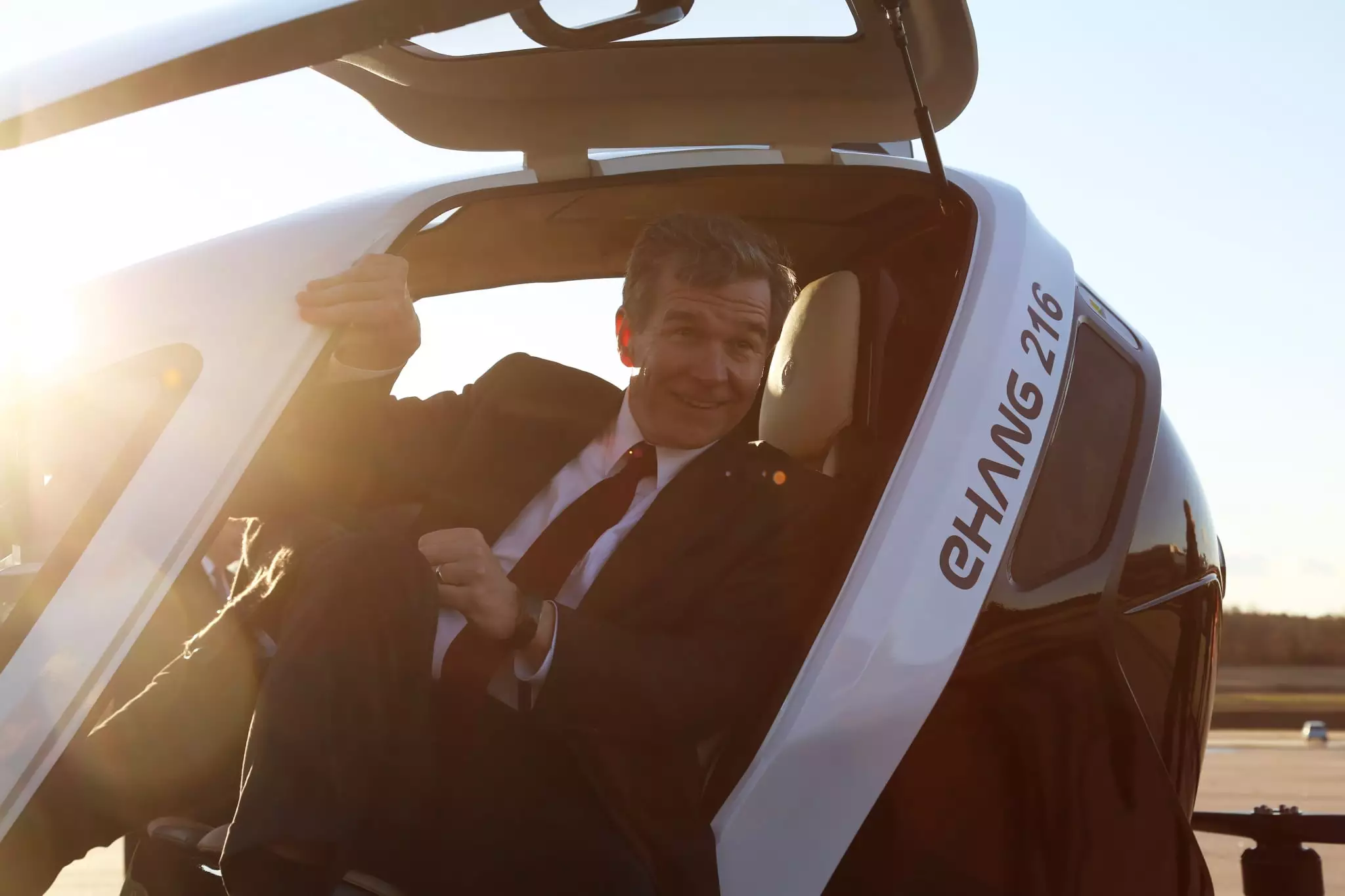 North Carolina Governor Roy Cooper posing with the Ehang 216