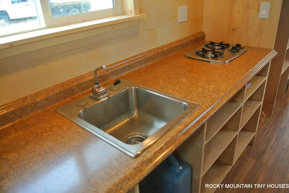 The Bitterroot Valley's kitchenette includes a sink and two-burner stove
