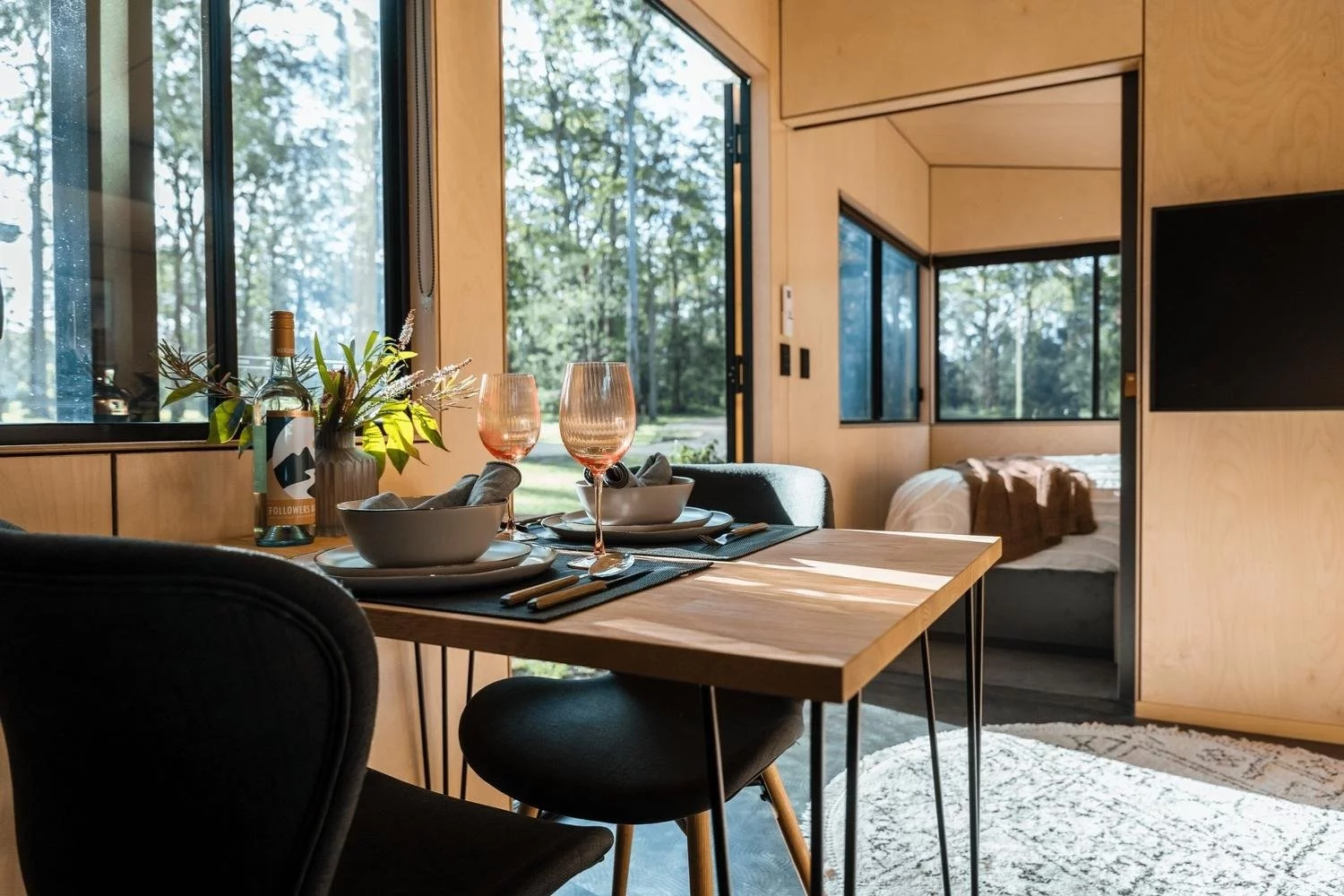 The Luna tiny house's interior is finished with birch plywood and timber oak flooring