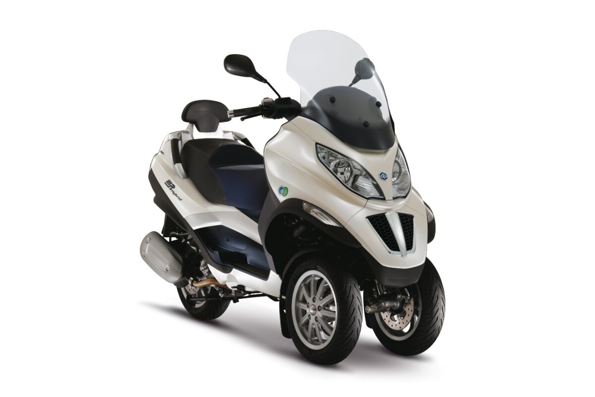 Piaggio's MP3 Hybrid 300 i.e. LT has been available since 2009, with a combination of a 278 cc internal combustion engine and an electric motor