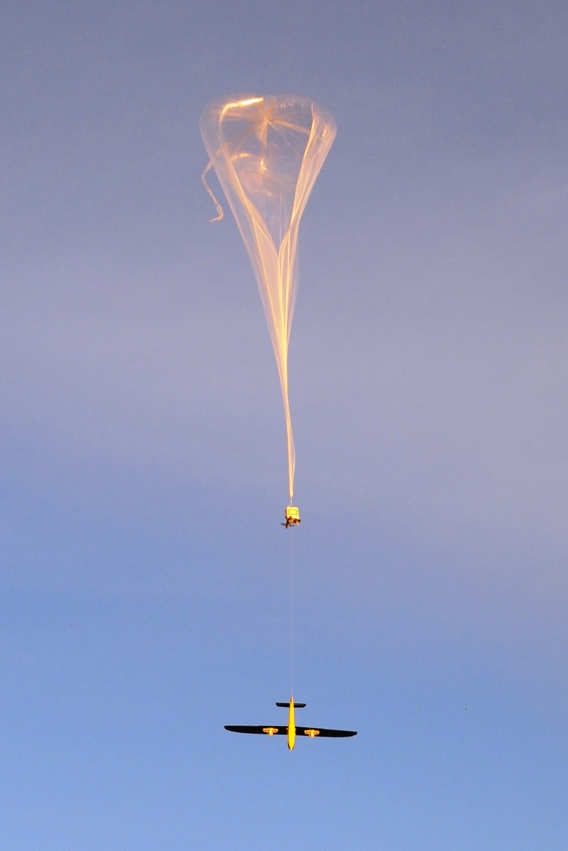 The CICADA-equipped Tempest UAV, being lifted to altitude by a weather balloon