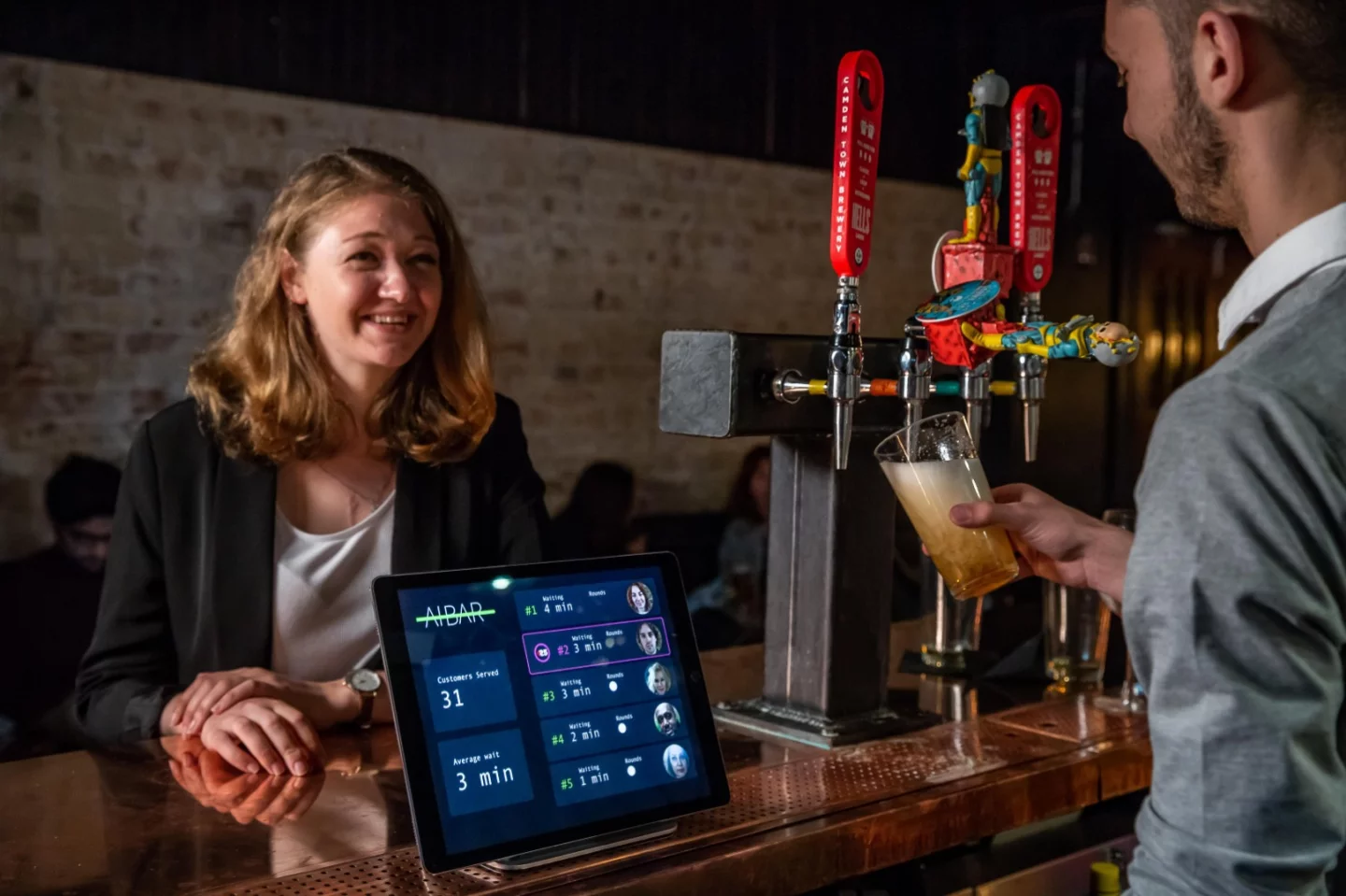 Bar staff are fed real-time virtual queue information onto an iPad from the A.I. Bar system