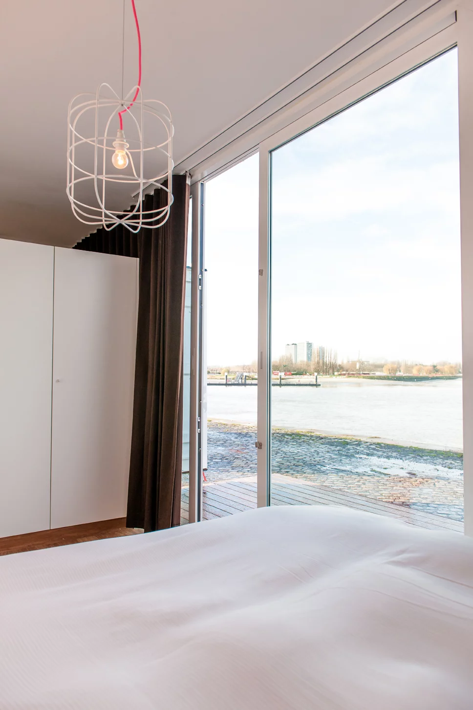 The main draw for the small-sized container hotel is it's ability to easily pick up and move to more intimate locations, while still providing a comfortable bed and hot shower nearby