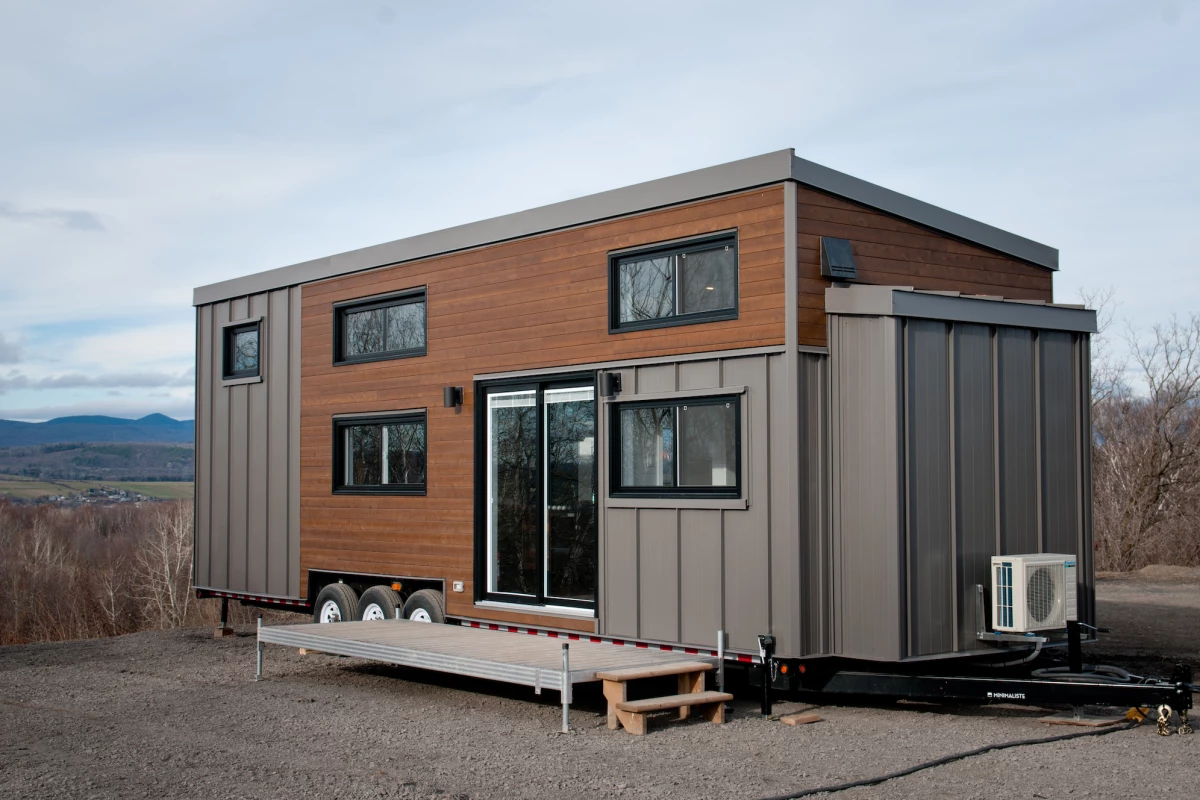 The Charme V2 measures 36 ft (10.9 m) in length and is finished in cedar, with steel accenting