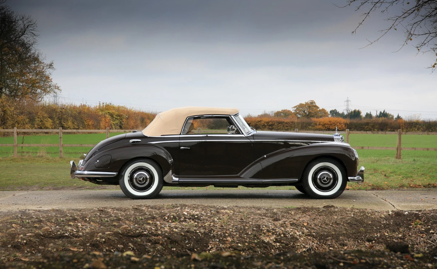 This 1954 Mercedes-Benz 300 S Roadster is a car which encapsulates the spirit of both per-and post-war eras for Mercedes-Benz. This was the road car which Mercedes-Benz produced specifically in order to become the world's most expensive and exclusive automobile. Built in a time of austerity and rationing, this roadster was the last word in opulence and sophistication.When launched at the Paris Salon in 1951, it cost twice as much as a Cadillac, and its modernized 540K styling attracted royal owners such as King Faruk of Egypt and the Aga Khan, and the most dashing male lead movie stars of the day in the form of Cary Grant and Gary Cooper. Much rarer (800 only) than a 300 SL and far more luxurious, three body styles were offered: a 2+2, coupé or the rarest roadster version. It offered extraordinary value and exclusivity beyond the 300 SL, selling for $793,713 (€646,250)