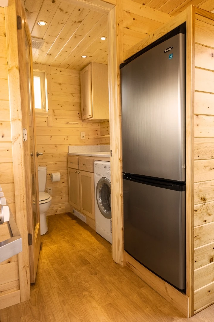 The Vista Boho's bathroom includes a shower, sink and toilet. The washer/dryer is also stowed away in there too